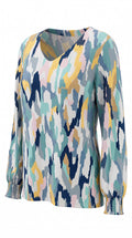 Kim Gravel Belle multi-color abstract print long sleeve top with V-neck and smocked cuffs in rayon viscose and spandex blend.
