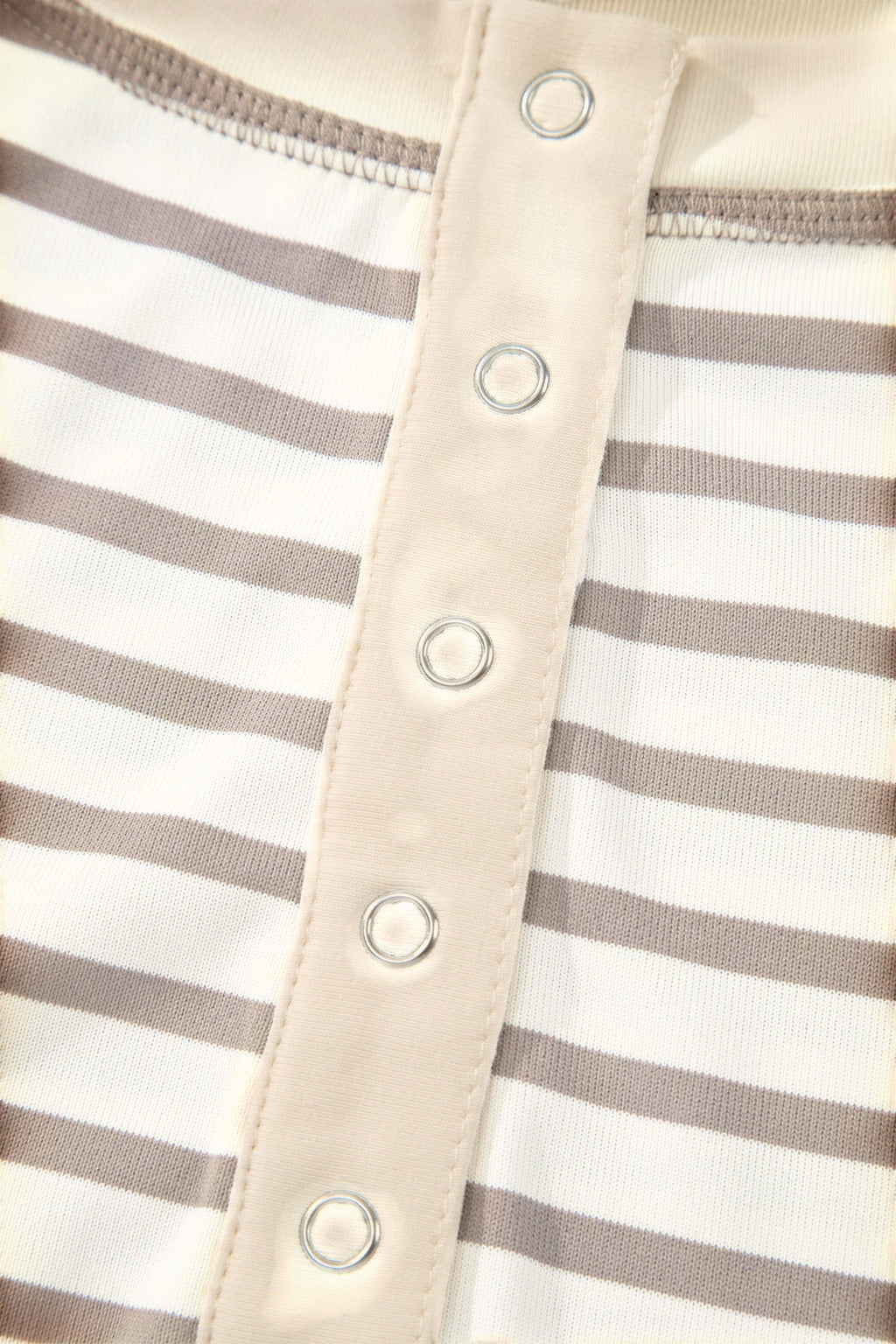 Somethinguluv3 brown and white striped top featuring a button-down placket with silver metal hardware details