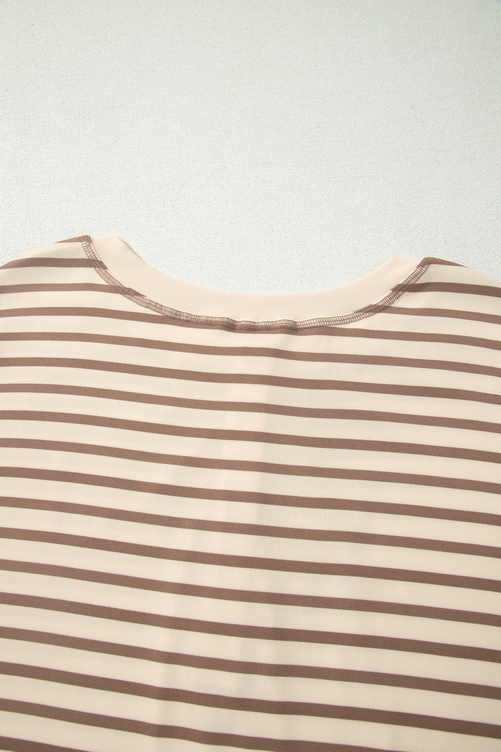 Somethinguluv3 brown and cream striped short sleeve top with a round neckline