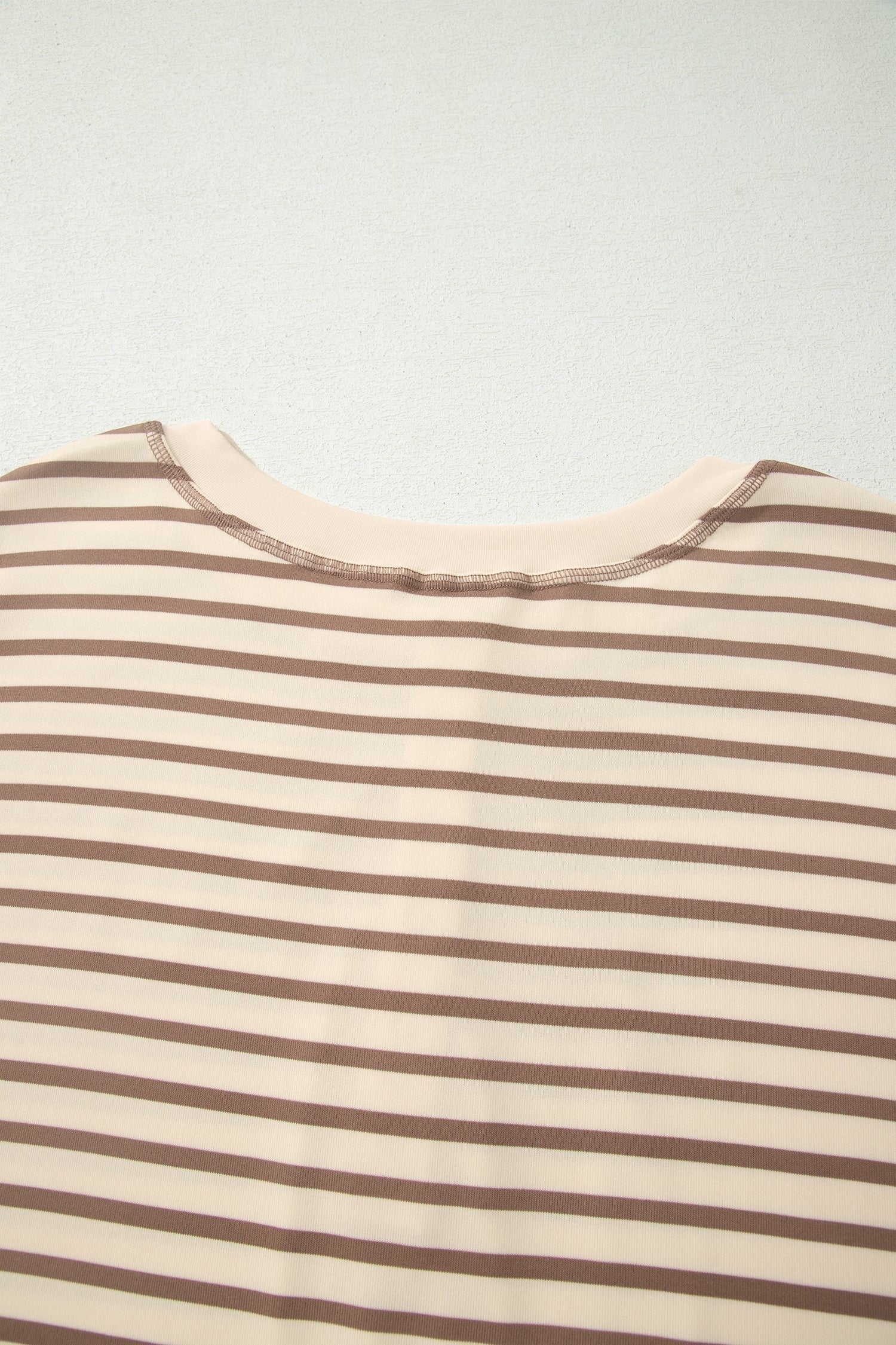 Somethinguluv3 brown and cream striped short sleeve top with a round neckline