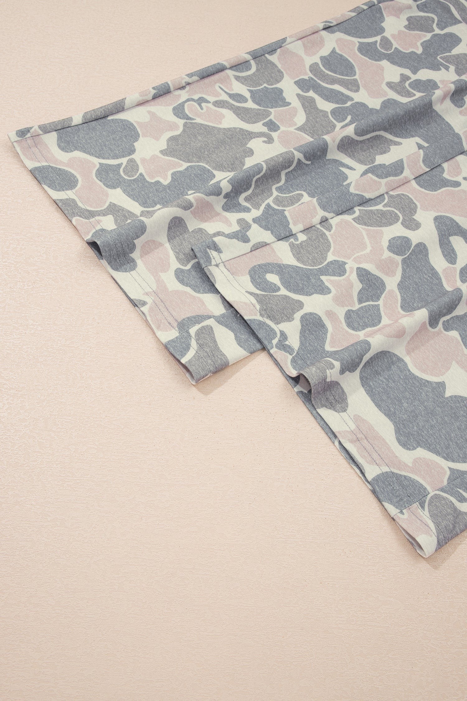 Somethinguluv3 casual lounge set featuring a soft, muted camouflage print in neutral tones on lightweight fabric.