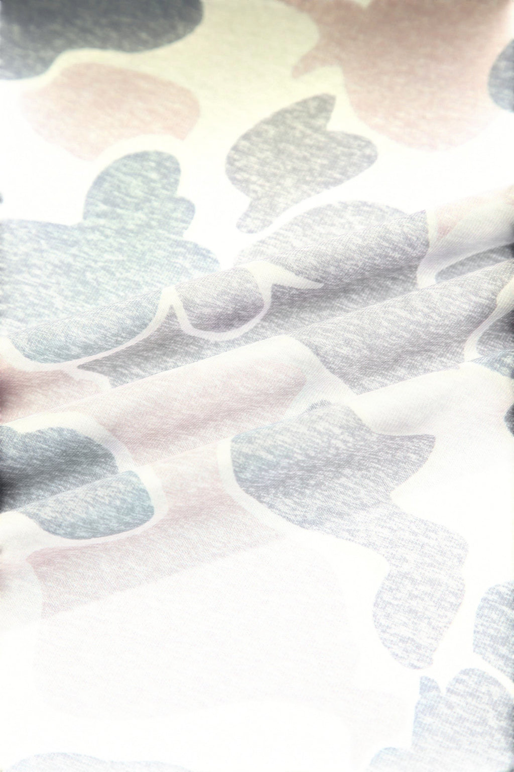 Somethinguluv3 lounge set fabric featuring a soft muted camouflage print in neutral grey and pink tones