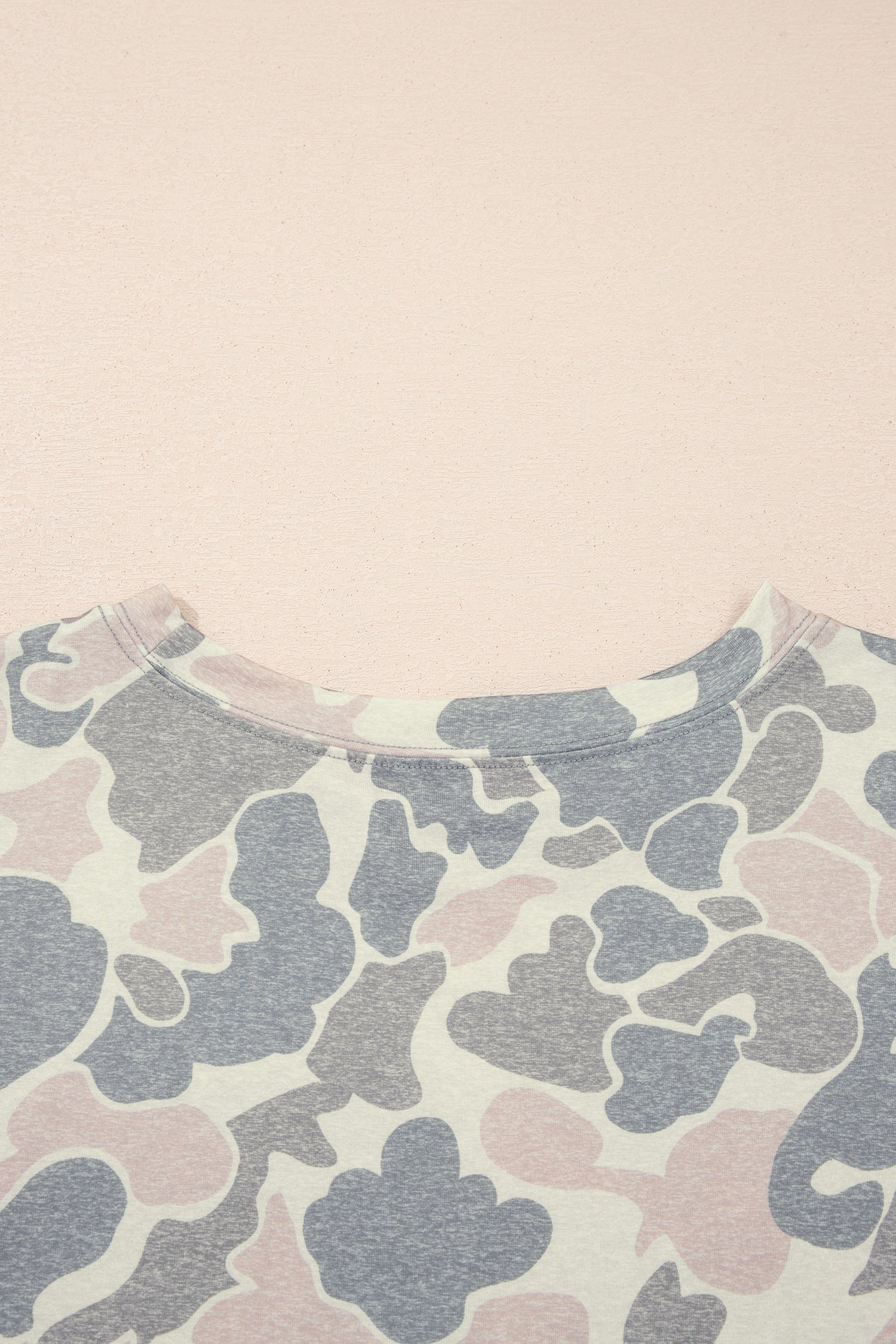 Somethinguluv3 casual lounge set featuring a soft crew neck top with a muted grey and pink camouflage print pattern.