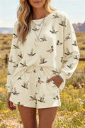 Somethinguluv3 casual lounge set featuring a cream long-sleeve crewneck sweatshirt and shorts with a green duck print.