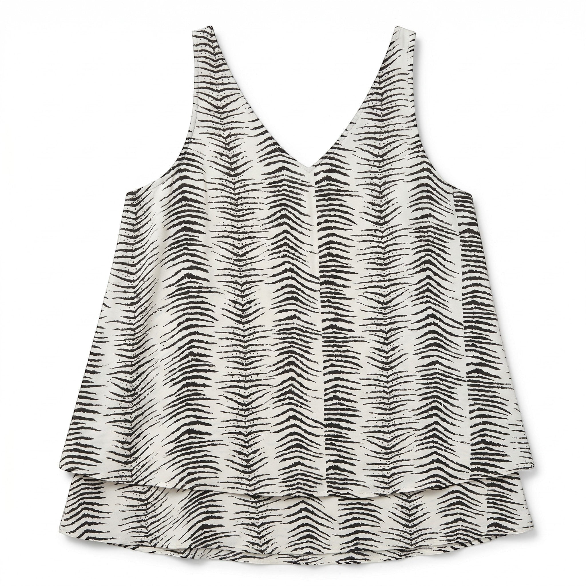 Somethinguluv3 sleeveless layered tank top in black and white abstract tiger print with a V-neckline.