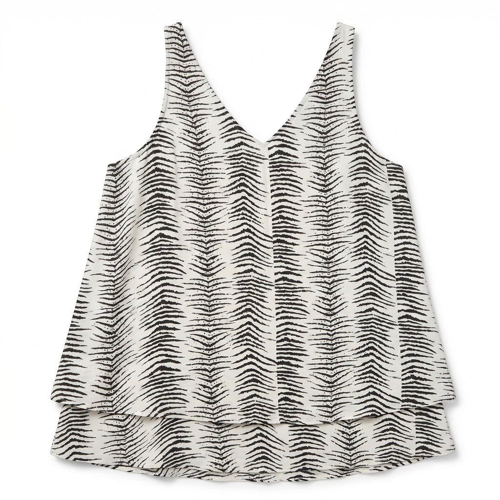 Somethinguluv3 sleeveless layered tank top in black and white abstract tiger print with a V-neckline.