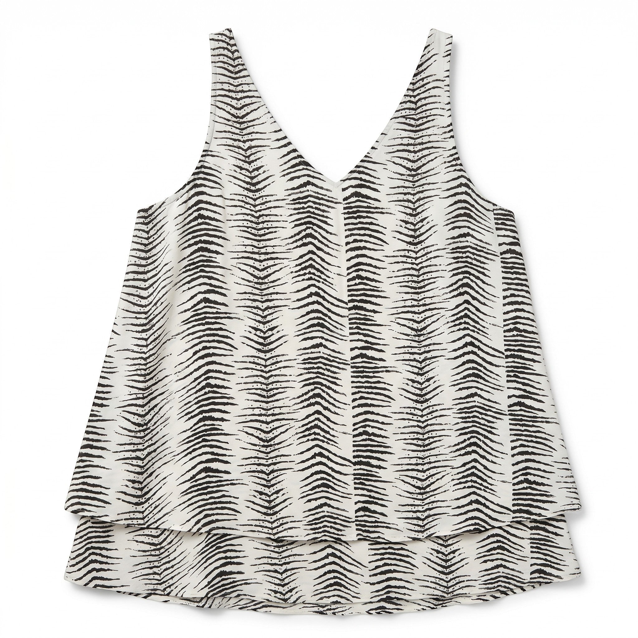 Somethinguluv3 sleeveless layered tank top in black and white abstract tiger print with a V-neckline.
