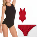 Somethinguluv3 Penbrooke red popcorn texture active one-piece swimsuit with high neck and cutout back detail.
