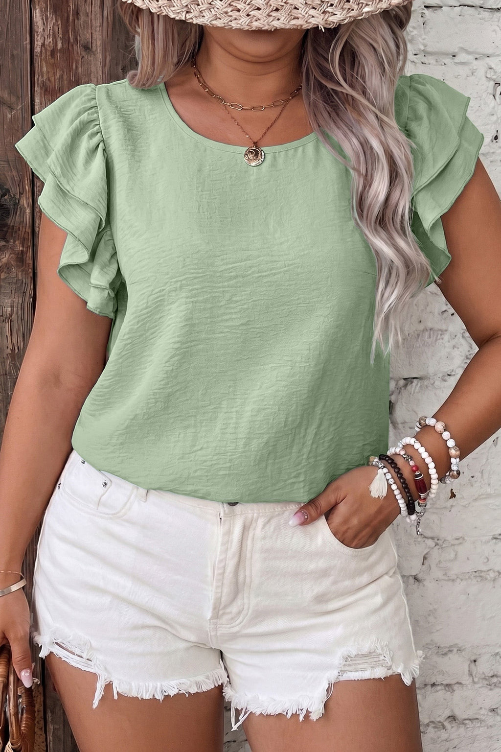 Somethinguluv3 plus size sage green blouse with round neck and layered flutter sleeves paired with white denim shorts
